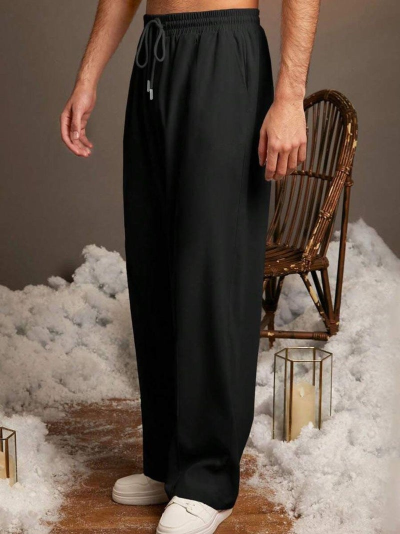 فلاينوف بنطلون رياضي رجالي كوري أسود سادة بقصة فضفاضة - Image 2